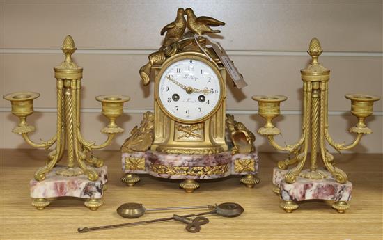 A French ormolu and marble clock garniture